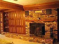 Built in FP, cabinetsm & bookcase in Family Room