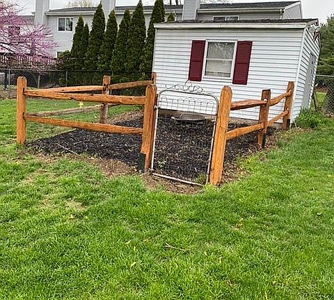 Shed with fenced garden