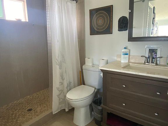 Large bathroom with a Spacious shower stall