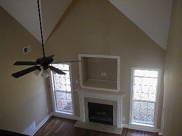 Great Room Has High Ceilings and Firepplace