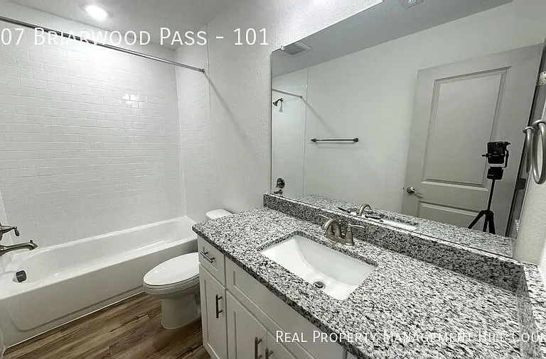 7707 Briarwood Pass #101 — Photo 20