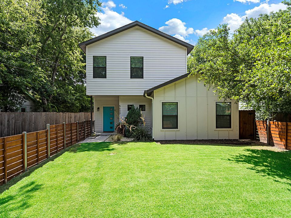 Front yard. Well-kept zoysia grass with lower water requirements.
