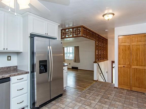 VIEW OF KITCHEN LOOKING INTO LR ,AND NEW PANTRYjavascript:ManageMediaJS.doneEditDescription(4);