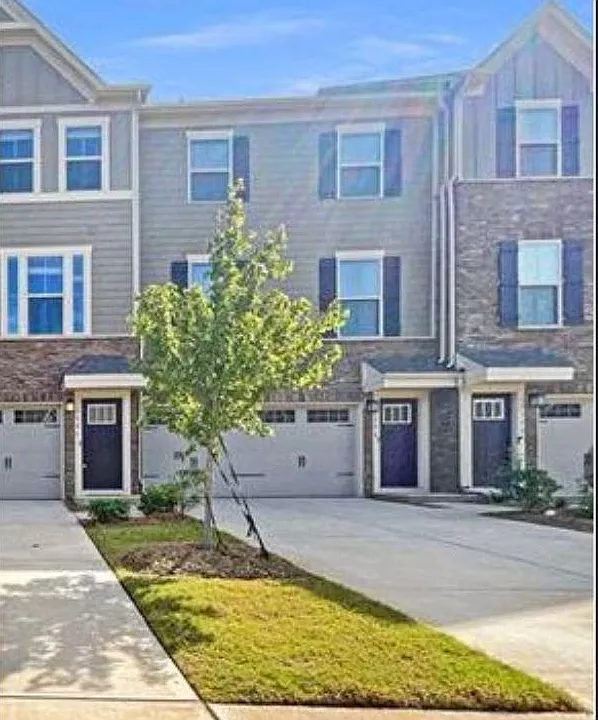Front of townhome and garage