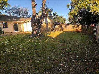 Large, fence backyard.