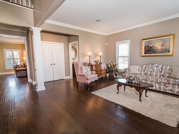 Wide plank hand scraped hardwood flooring throughout first floor. Formal Living Room has crown moldi