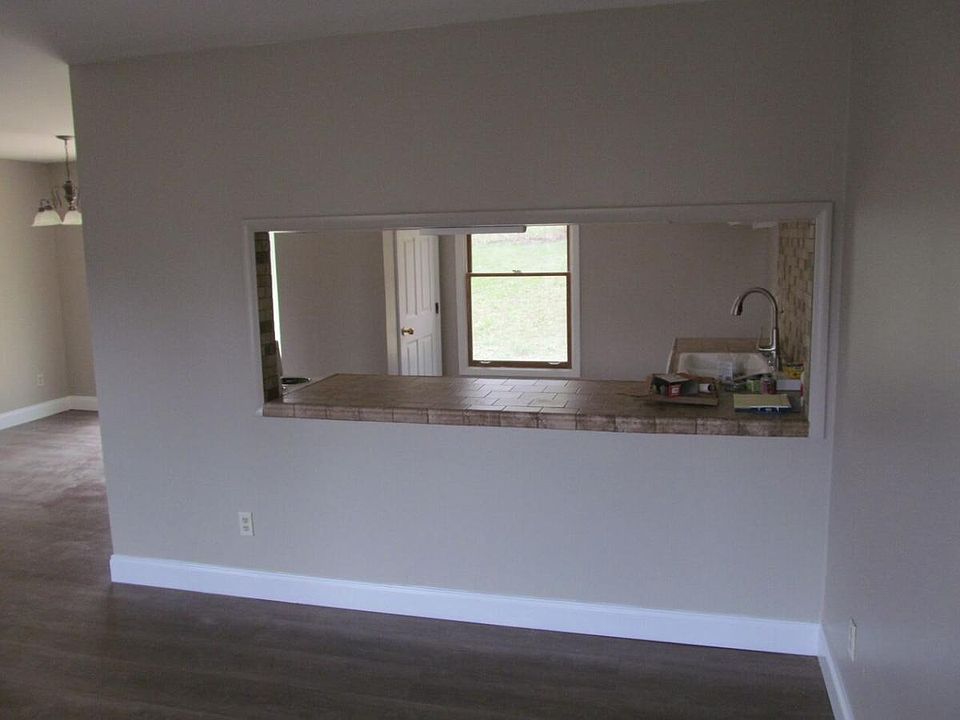 kitchen opens into lovely living area