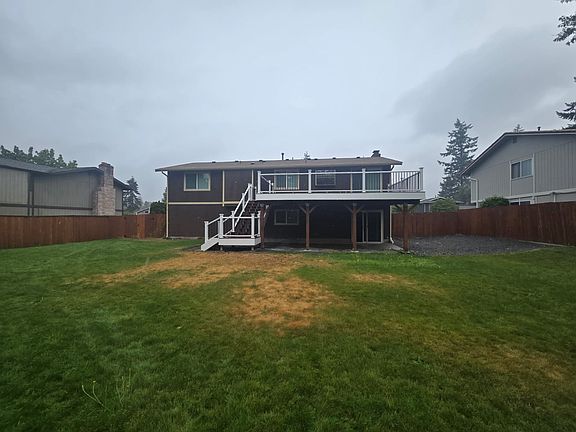 large backyard with huge deck