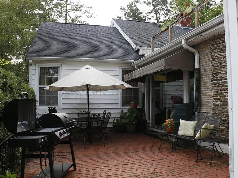 brick patio comes with the metal table, chairs and bench