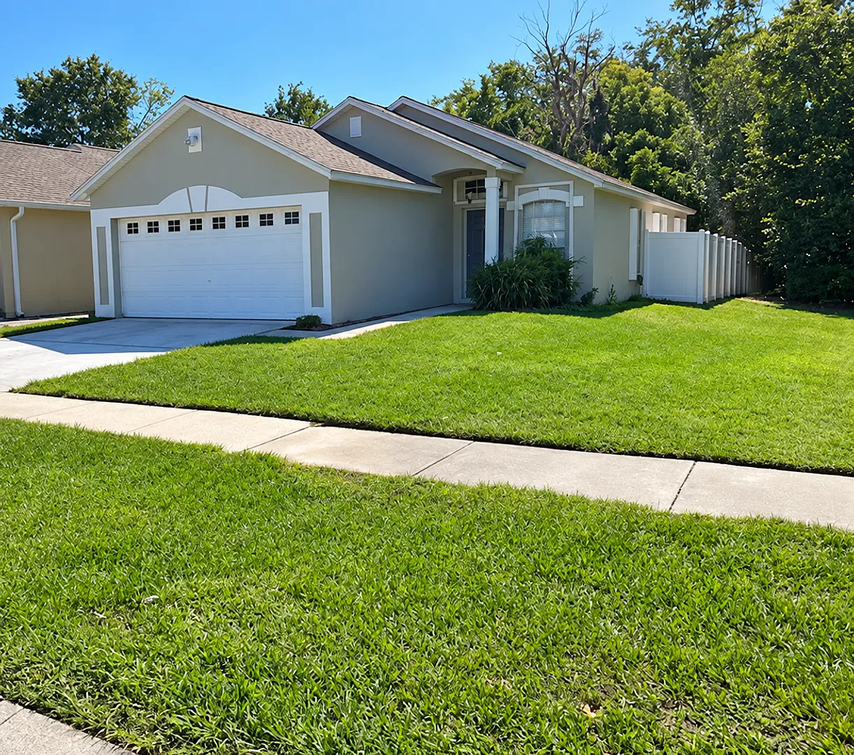 This charming 3 Bedroom, 2 Bath Single Family Home For Rent at 2216 Phonecia Ct. Orlando, FL 32837 — Photo 1