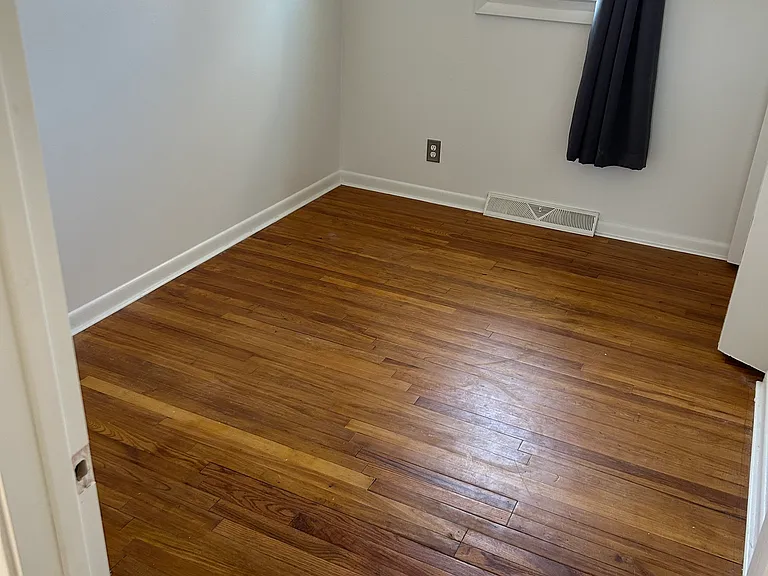3rd bedroom with original hardwood floor.
