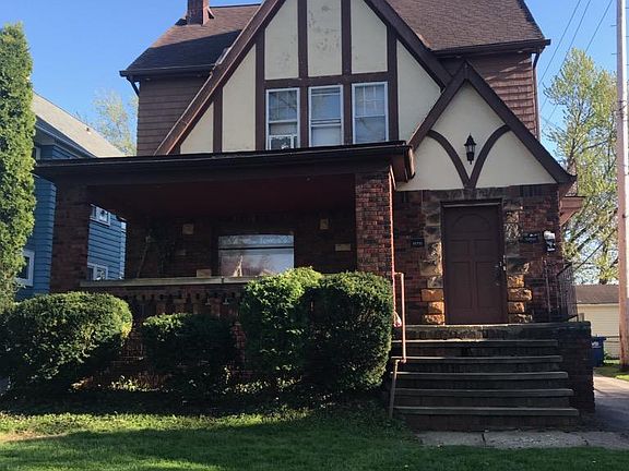 Exterior with covered front porch newly painted