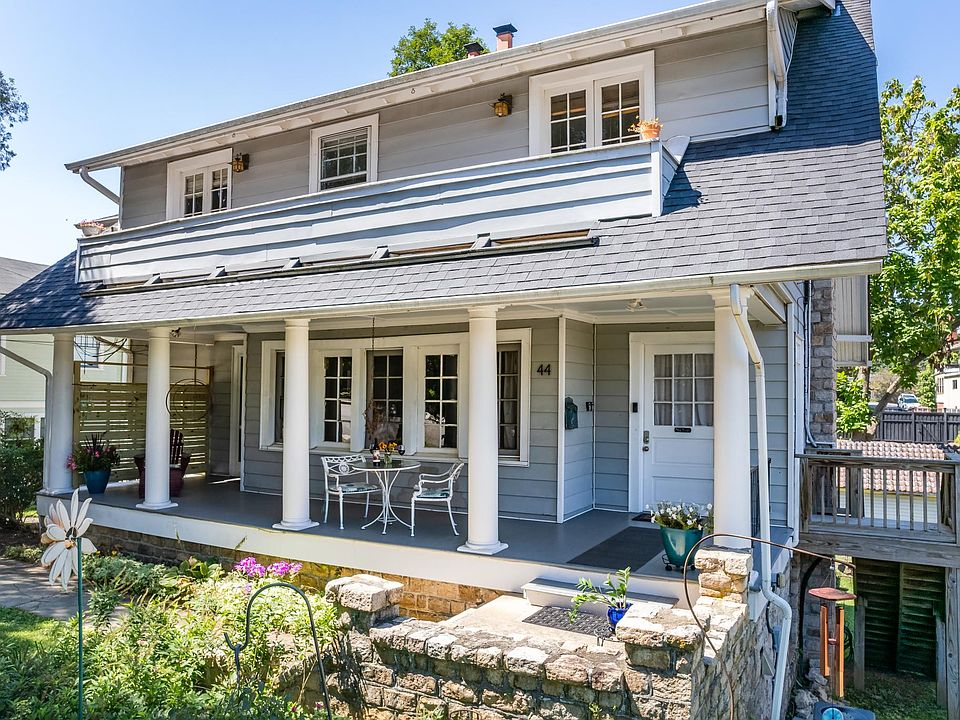 Close up of front of the house showing the front porch.
