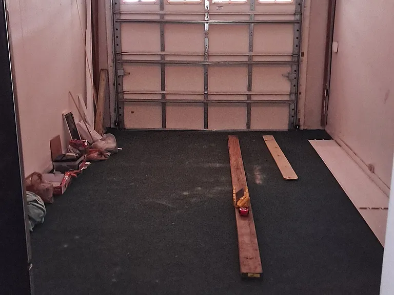 Garage - can be made into an extra room. AC Vents and carpeted.