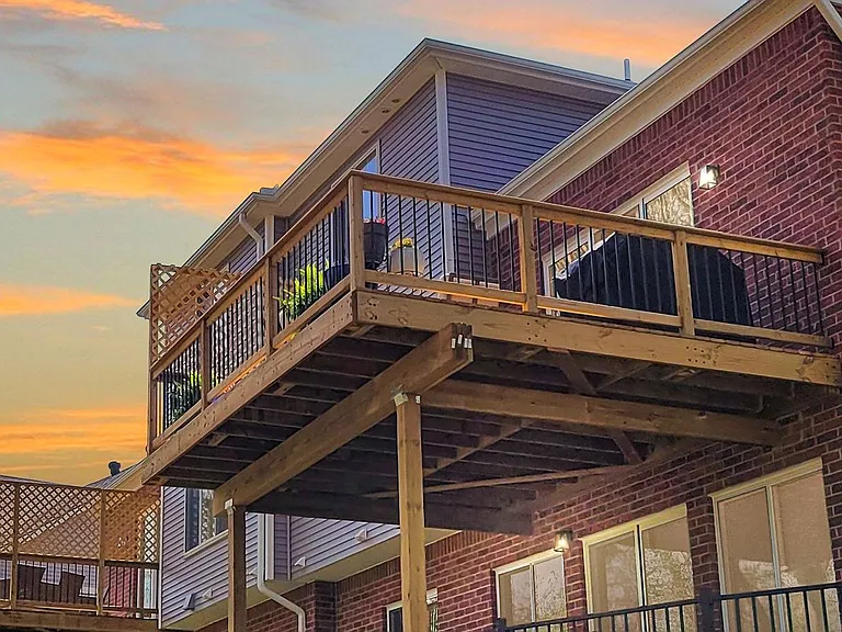 Dramatic Two Story Balconies Await