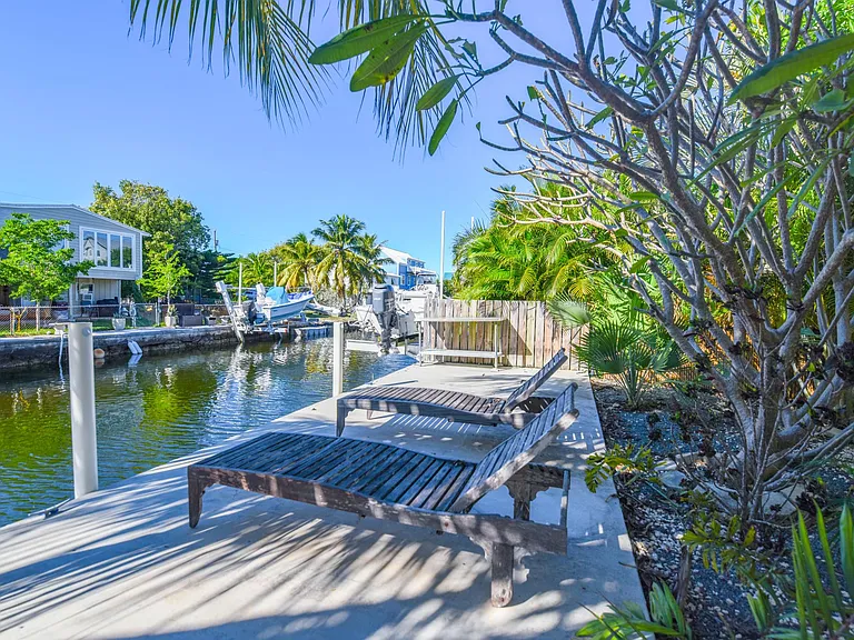 Private boat dock with sun loungers