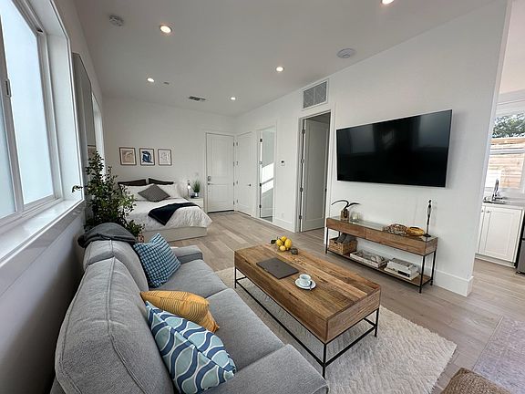 65" 4k TV w/ full motion mount