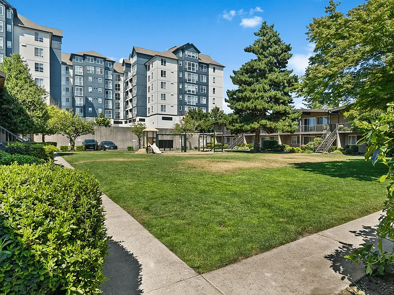 Enjoy the charm of a quiet, well-maintained community with easy parking and inviting outdoor spaces.