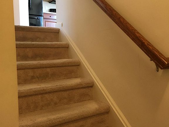 Stairs to the family room and kitchen