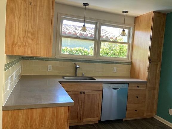 Kitchen with dishwasher and gas stove