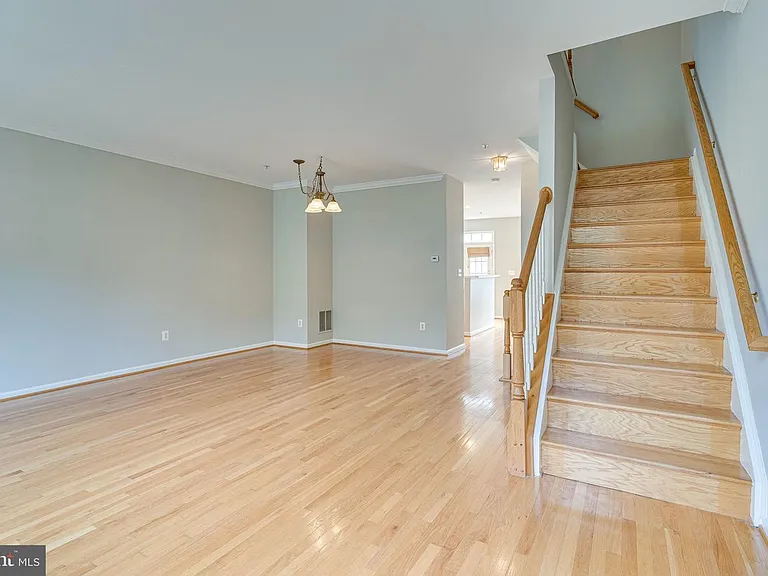 Main Floor, steps from second level up to third level