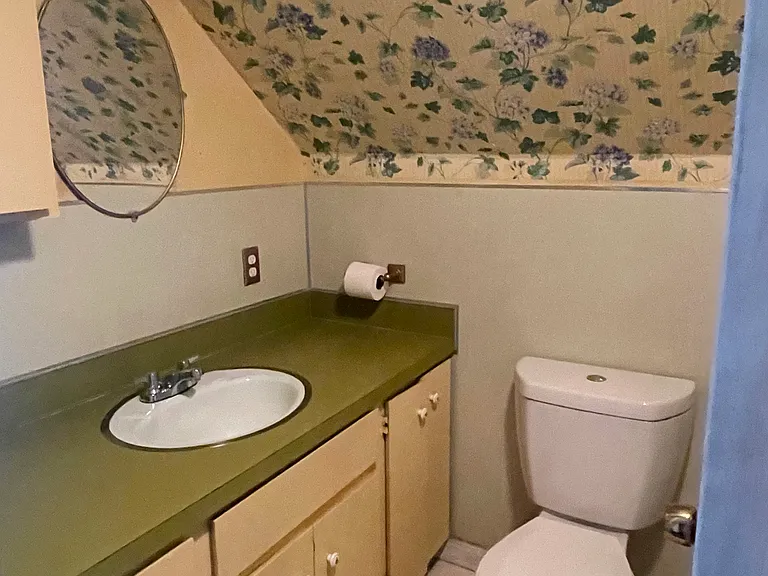 upstairs bathroom with tiled shower