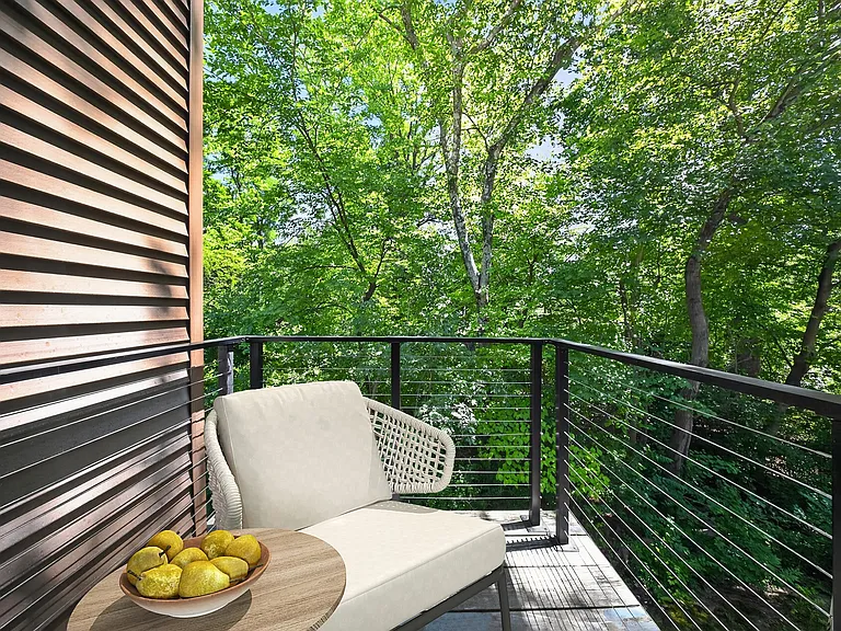 Enjoy serene moments on your private balcony at The Woods at Ambler, an Eagle Rock Community. Surrounded by lush greenery, it's the perfect spot to unwind. Embrace tranquility todayschedule your visit and see it for yourself!