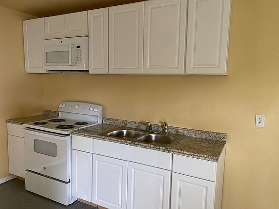 New stove and microwave with vent.