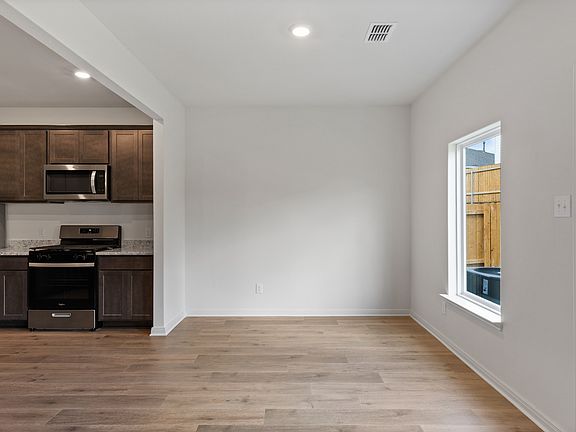 The dining room has a large window.