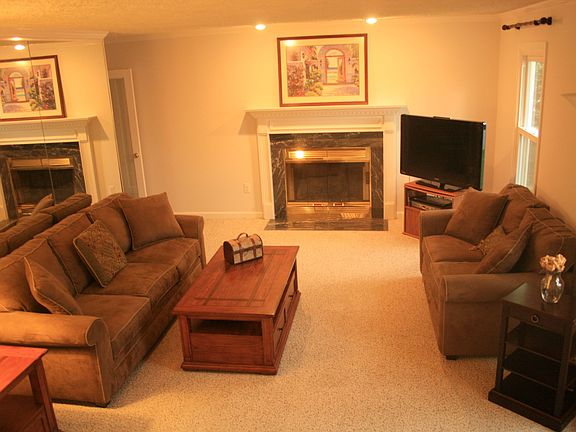 Marble fireplace in livingrm