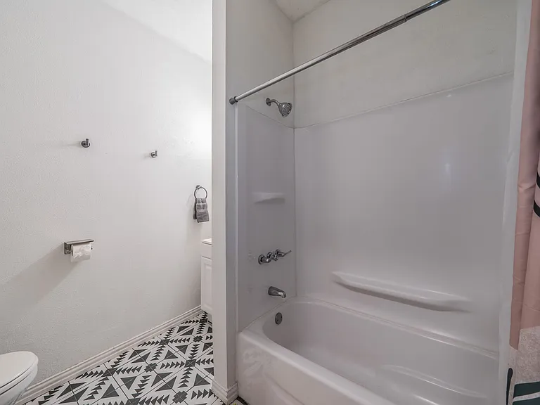 Refresh in the full-sized bathtub and shower combo.