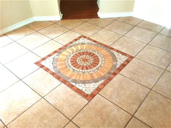 medallion tile inlay in foyer
