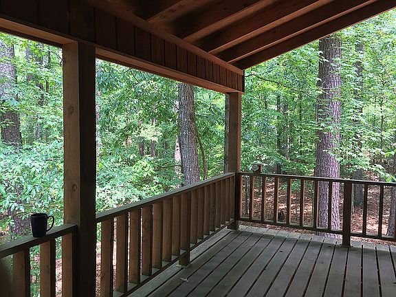 Large deck overlooking woods
