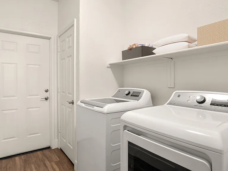 Simplify your routine with a washer and dryer inside your home.