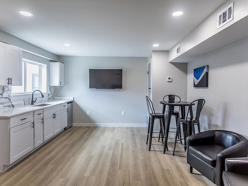 Experience modern elegance in this bright kitchen and living space.