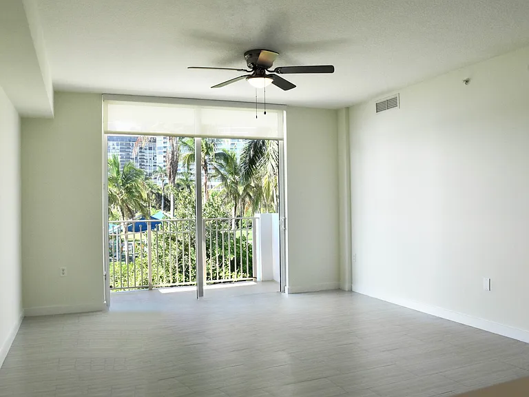 Spacious Living Area with Ceiling Fans