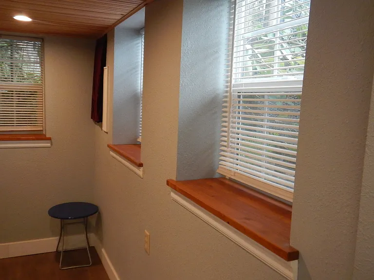 bedroom 3 windows wooden ceiling, adjustable can lights