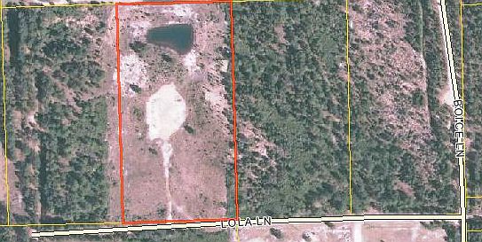 Aerial view/house pad/pond