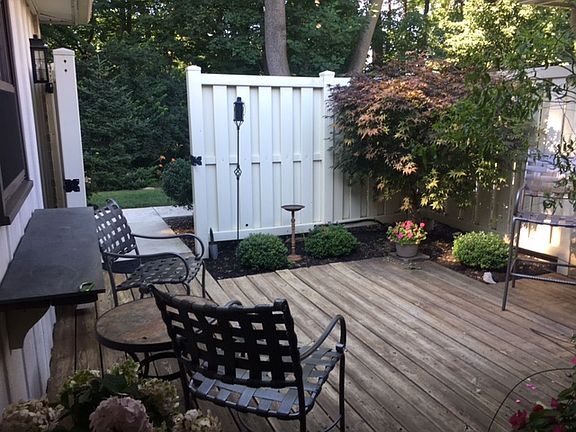 Patio with view of woods