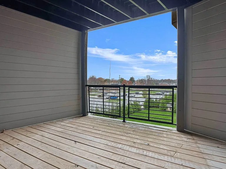 Step onto your private balcony for peaceful views of the surrounding Clintonville neighborhood _ perfect for coffee mornings or evening sunsets. Step onto your private balcony for peaceful views of the surrounding Clintonville neighborhood _ perfect for c