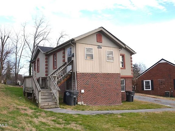 Separate entrance to the upper unit at 214 E. Ravine Rd