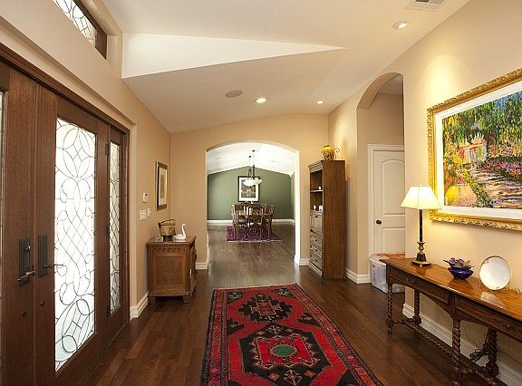 Spacious entry with Taun flooring