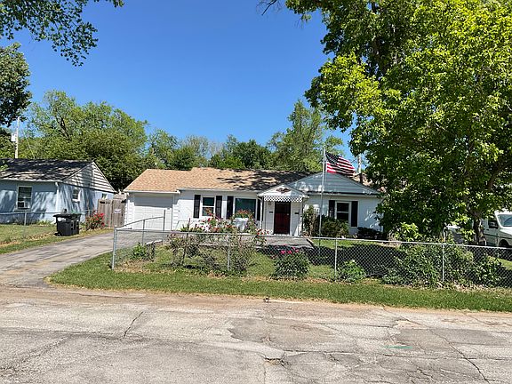 761 S 69th Street 
With flagpole and Magnola Tree.
Yard is fenced in.