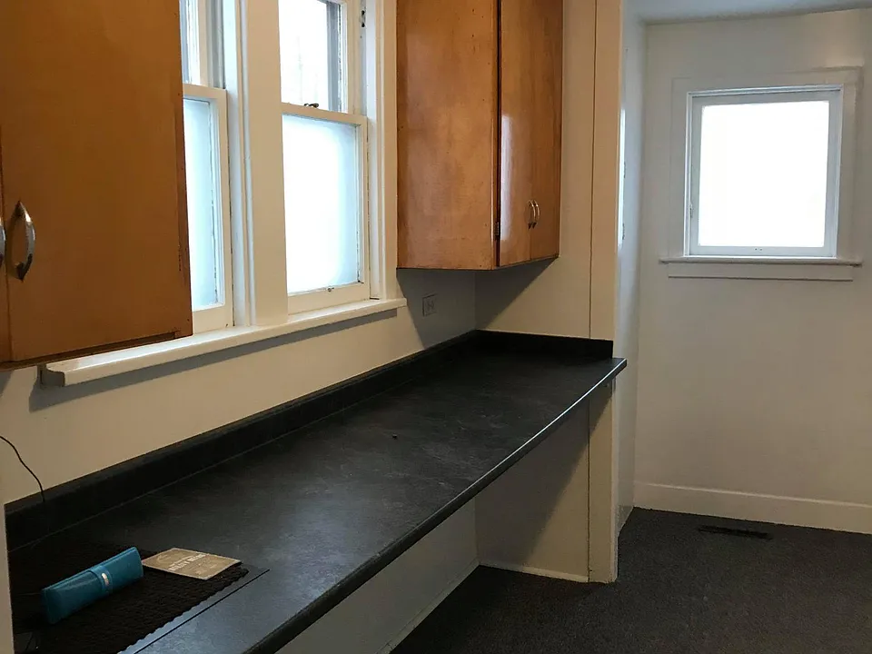 Laundry room with back entrance