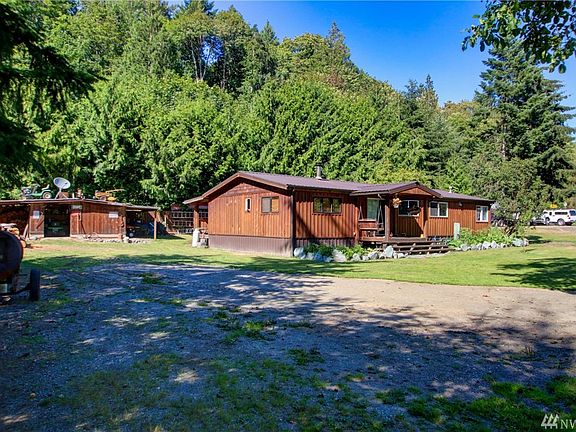 Home has new cedar siding and metal roof. Plenty of storage in garden shed. 