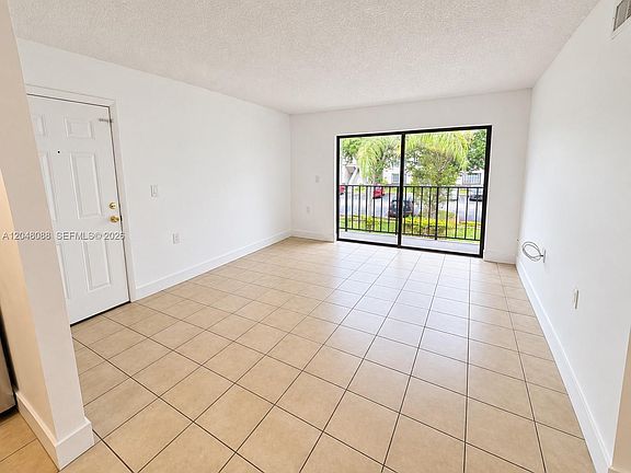 5th image of 7095 NW 179th St APT 209