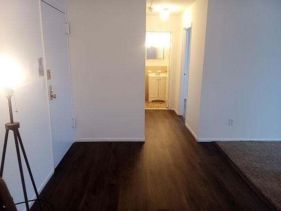 Dining area and hallway to bath