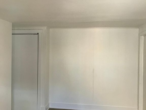 Entryway and portion of living area
