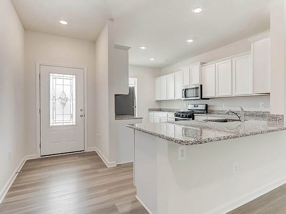 The kitchen in the Potomac comes equipped with gorgeous granite countertops and