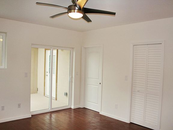 Master suite has sliding doors to the lani